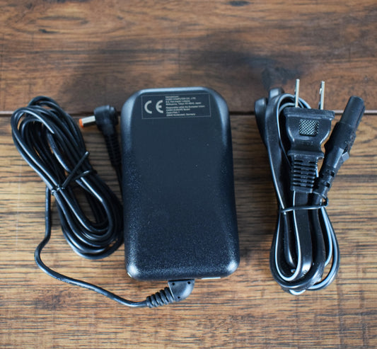 Casio AD-A12MLA 12V AC 1.5A Center Negative Barrel Power Supply Open Box