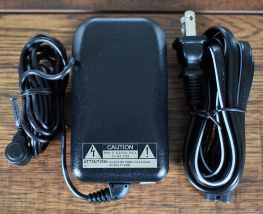 Casio AD-A12150LW 12V AC 1.5A Center Positive Barrel Power Supply Open Box